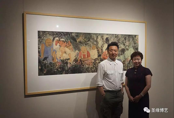 著名艺术家李旺与此次展览策展人圣缘博艺艺术馆董事长贾亚娟女士合影