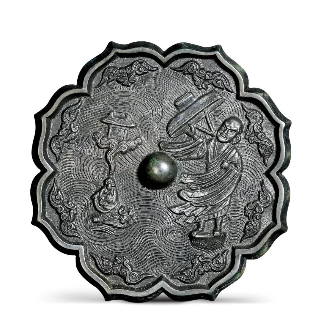 中贸圣佳艺文志:铸在铜镜上的山水人物画